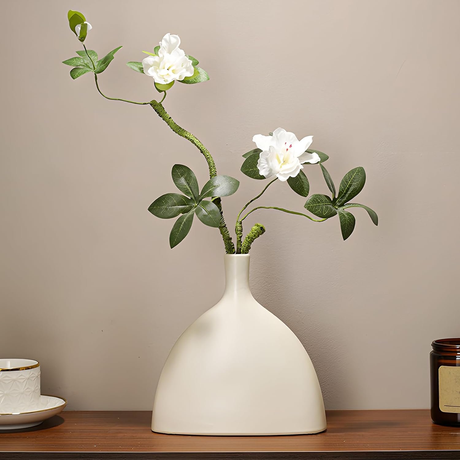 White ceramic vase, home décor, bohemian style, suitable for holding reeds.
