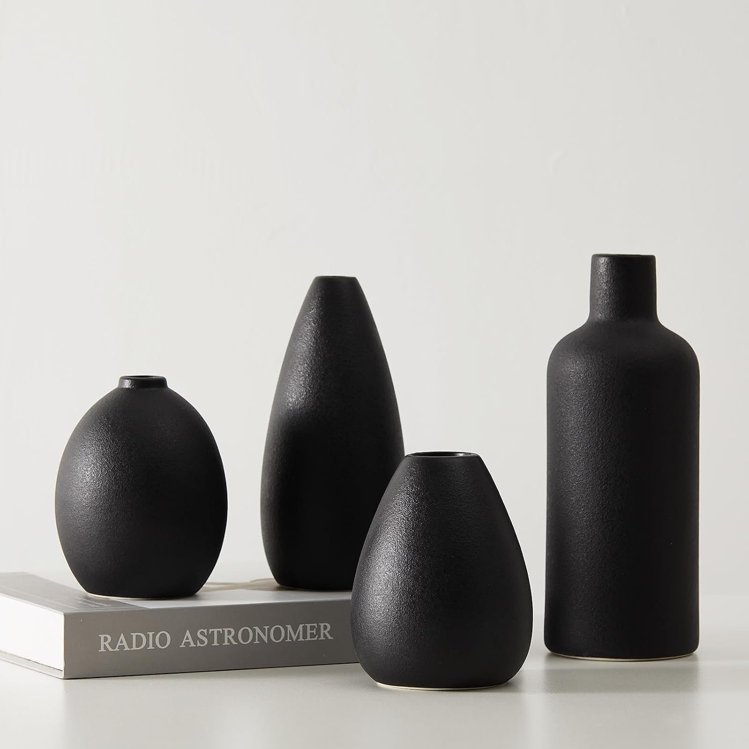Black Ceramic Vase Set - Four small and unique vases, perfect for flower arrangements, modern decorative pieces, home décor.